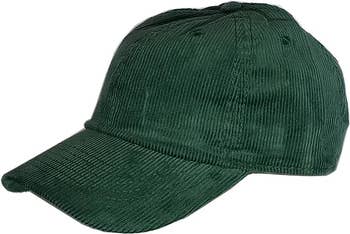 a dark green corduroy baseball cap