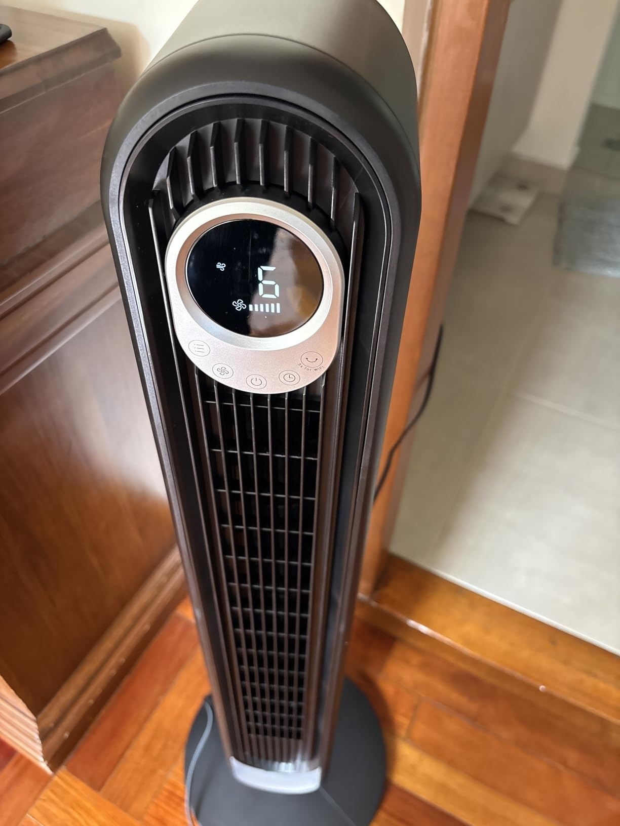 Tall oscillating operation    instrumentality   with a integer  display, shown successful  a room, suitable for location  cooling