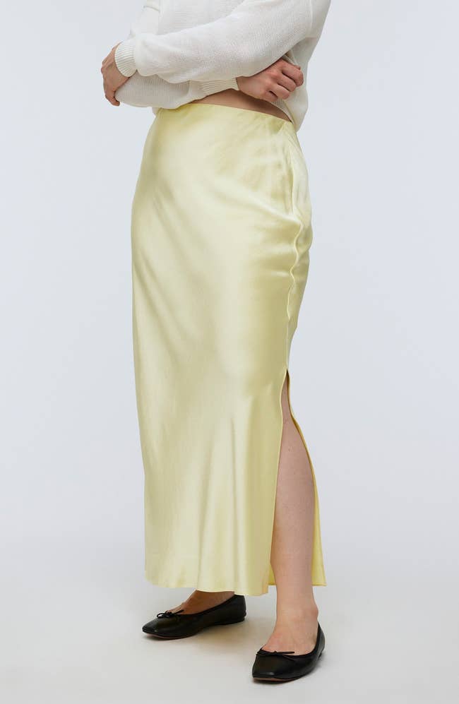 pale yellow midi skirt with knee-high slit