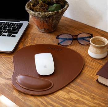 brown leather mouse pad with wrist support with name 