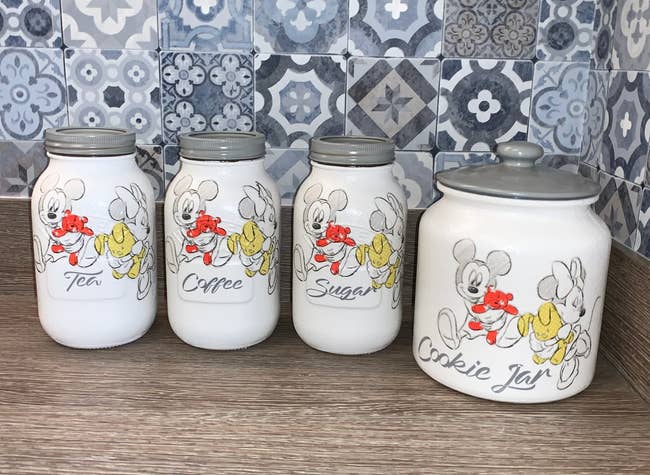 the mickey and minnie canisters for tea coffee sugar and cookies