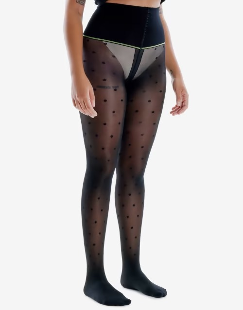 Image of model wearing polka dot tights