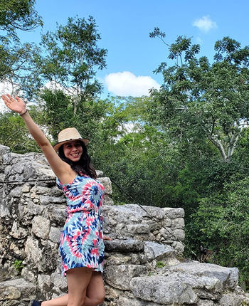 another reviewer wearing the tie-dye romper