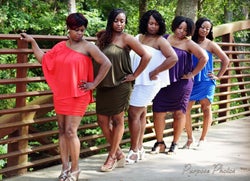 five reviewers wearing the dress (red, green, white, purple, blue) with one shoulder off and one on
