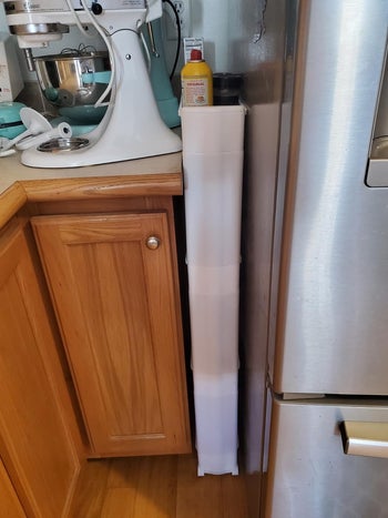 storage unit slide between cabinets and fridge