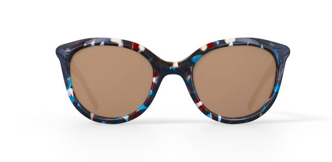 Stylish sunglasses with a bold, patterned frame and tinted lenses, ideal for fashion-forward shopping enthusiasts