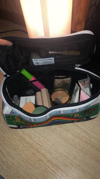 reviewer photo of makeup inside the bag