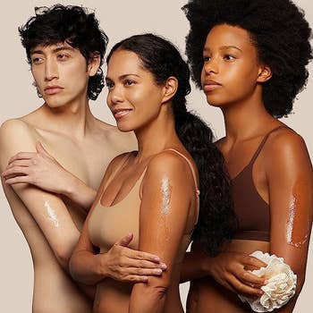 Three models using the body wash