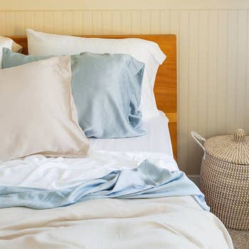 pillows in blue, white, and beige silk pillowcases
