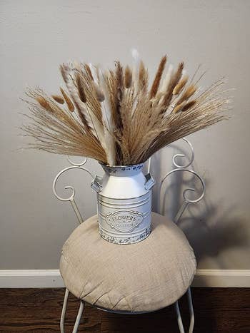 reviewer image of dried pampas in a vintage jar