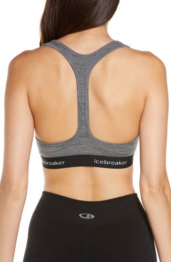 model showing the back of the grey bra