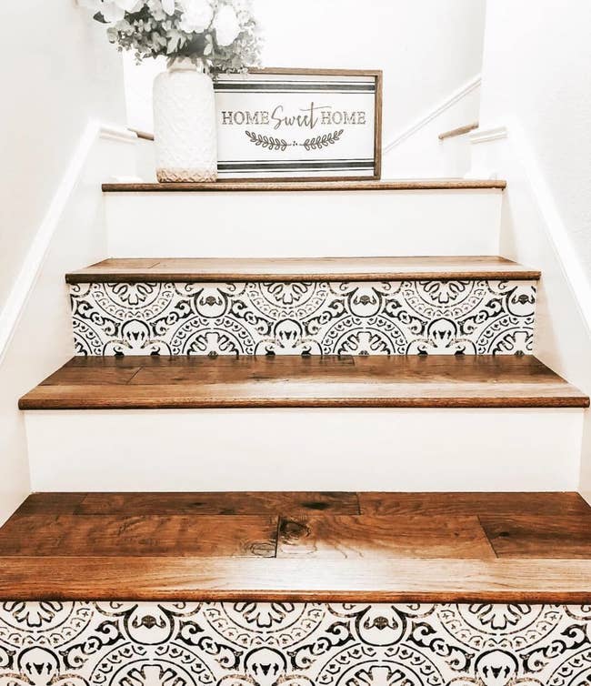 the black and white stair decals on a stairway