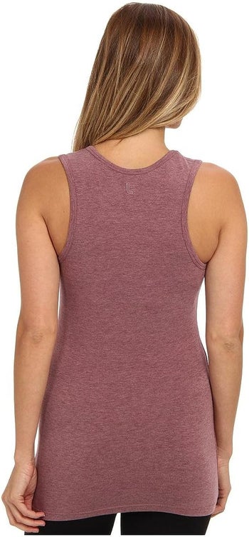 model wearing a tank top without straps showing