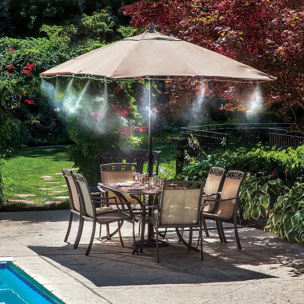 the mist releasing under an umbrella