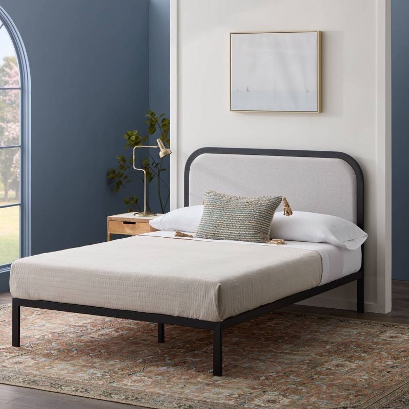 lifestyle photo of platform bed with rounded headboard