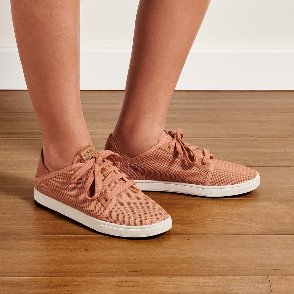 model wearing the mesh sneakers in pink with white sole