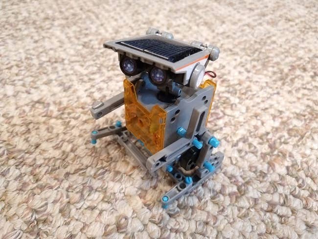 reviewer image of a built toy robot on carpet
