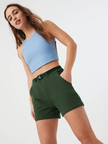 same model showing the pants now as shorts