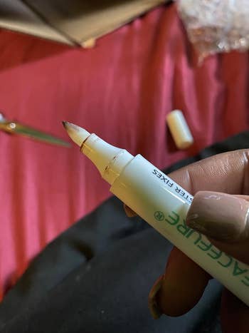a close-up of the makeup eraser pen tip 