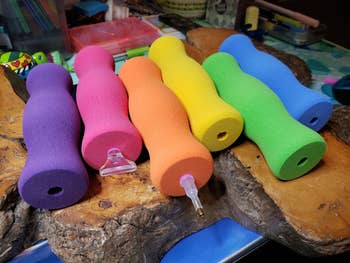 thick foam grippers around pencils in different colors