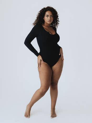 different model wearing the body suit in black