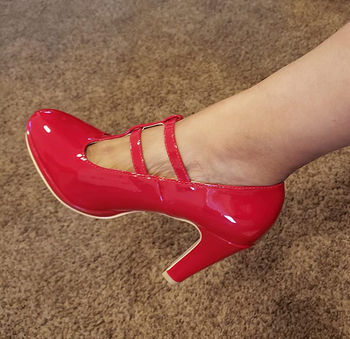 Reviewer wearing red heels
