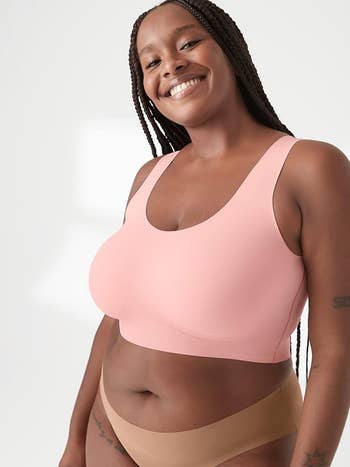 model in pink paloma scoop neck bra