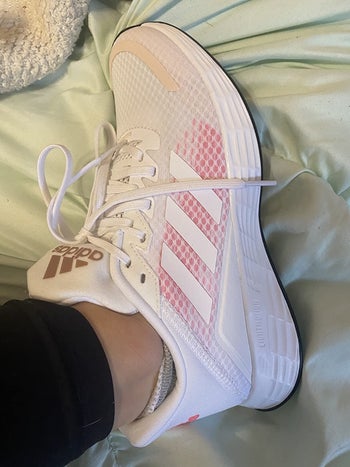 Reviewer wearing Adidas running shoe