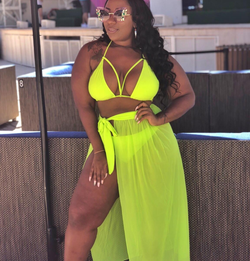 Another reviewer posing in neon yellow