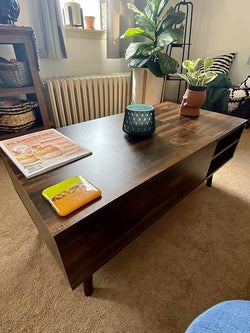 reviewer photo of coffee table with top in down position