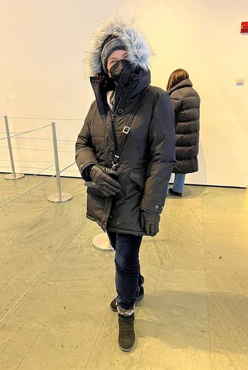 reviewer wearing the overgarment successful acheronian green