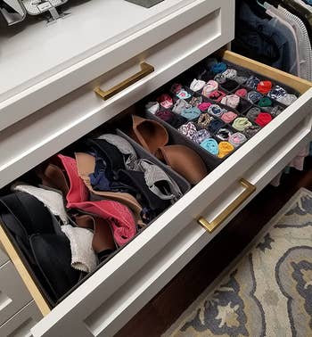 different reviewer's drawer with bras and underwear sorted in the bins