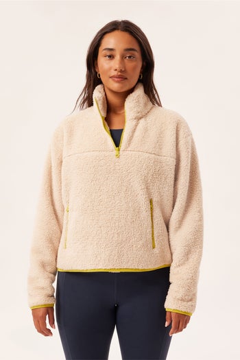 model wearing the fleece in beige
