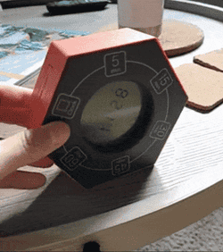 A gif of a reviewer moving the timer on its sides to change the time