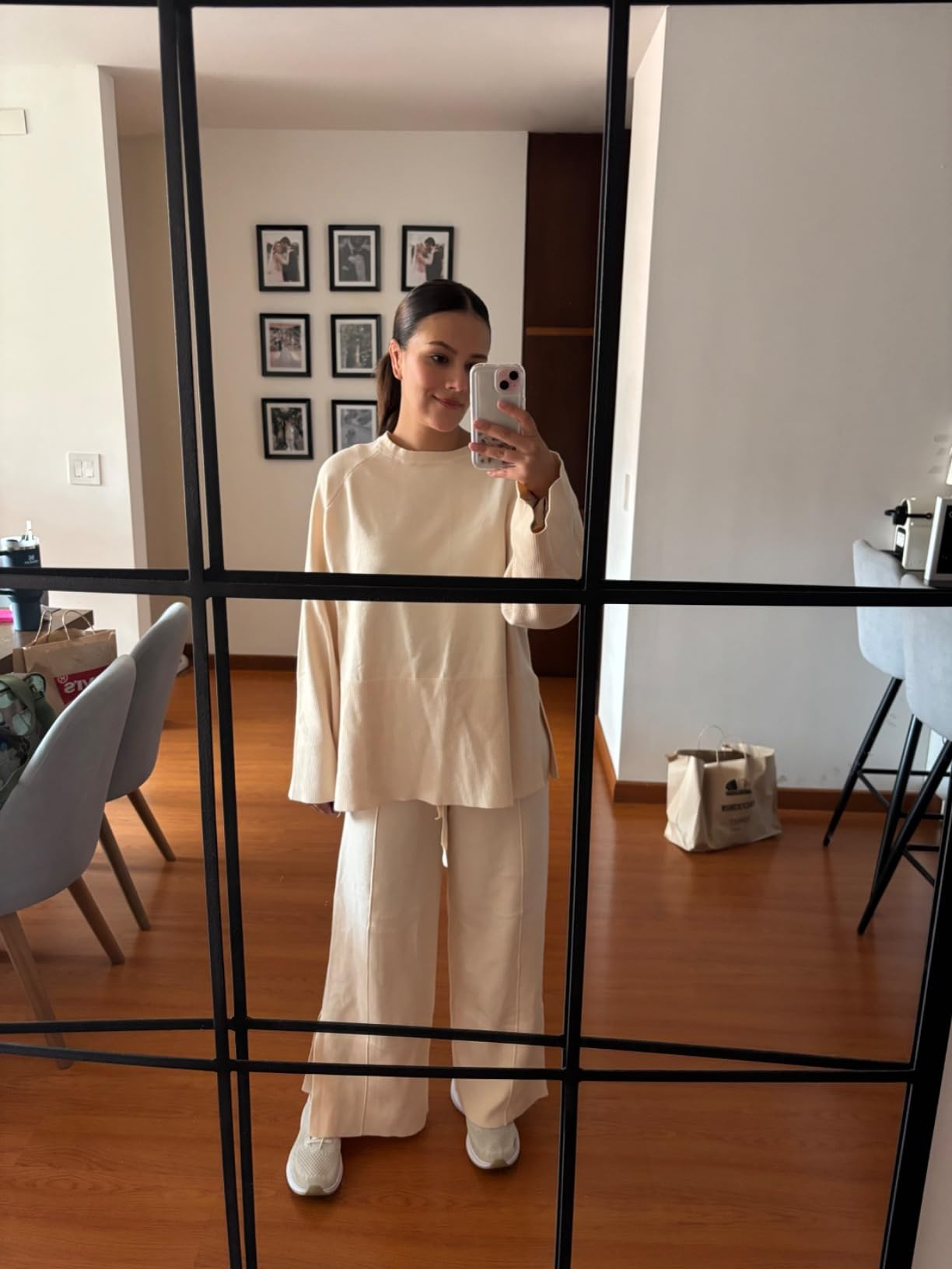 Person successful  a cozy pick  outfit takes a reflector  selfie successful  a surviving  country   setting