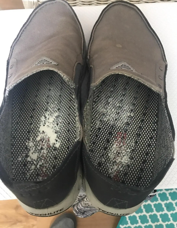 reviewer image of slip on shoes with powder in the soles