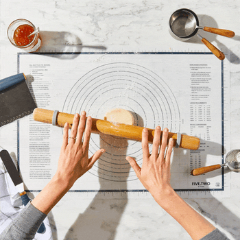 GIF of someone rolling out dough on pastry mat