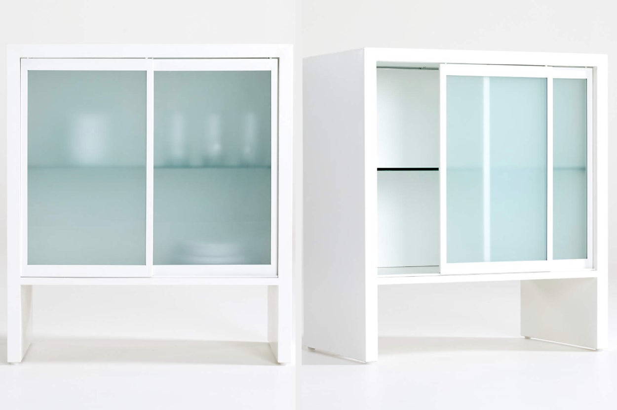 White and glass two shelf cabinet, interior view of product on a white background