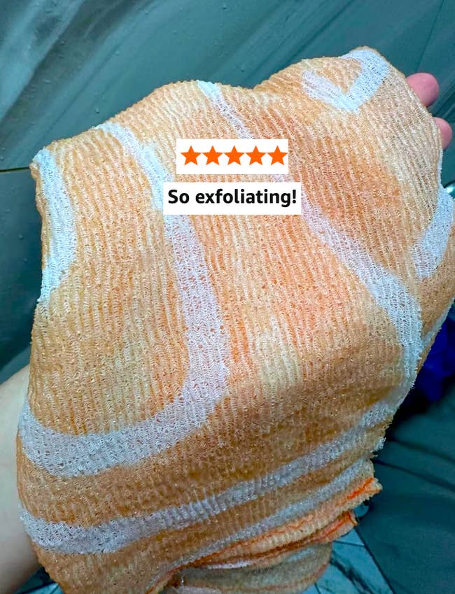 Close-up of a textured exfoliating towel with a manus holding it. A five-star standing and the substance