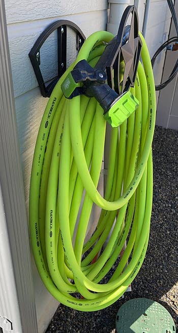 a reviewer photo of the hose rolled up 
