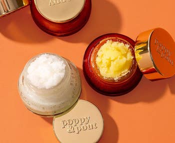 two jars of Poppy and Pout articulator scrub