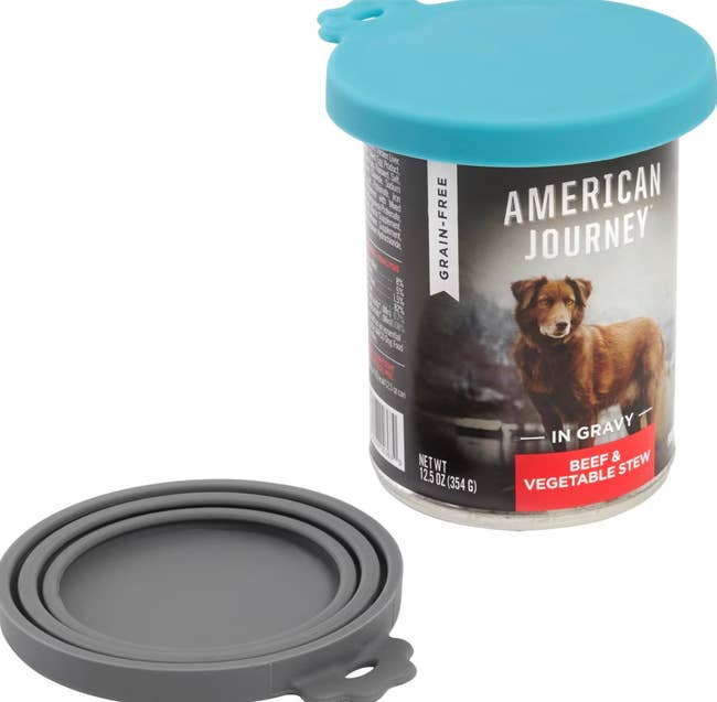 Dog food can with blue lid, labeled