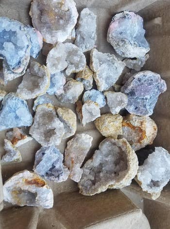 reviewer photo of all of the cracked geodes from their kit