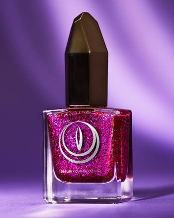 vibrant purple/pink glitter nail polish