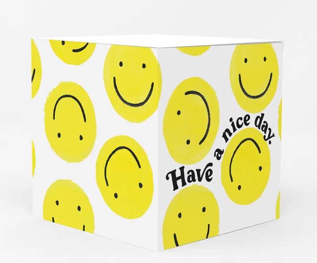 the smiley face sticky note pad
