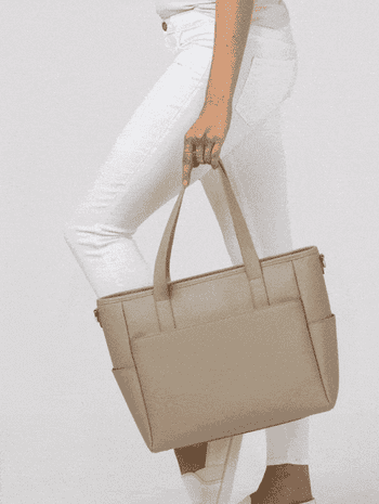 gif of model showing all the different ways the bag can be worn