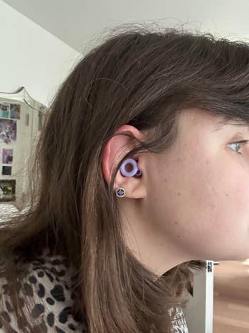 Katy wearing the lilac ear plugs