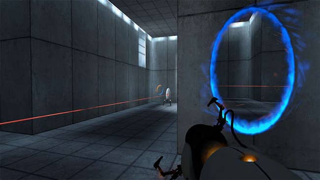 a screenshot from the game featuring a first-person POV showing a blue portal on the wall and a white turret 