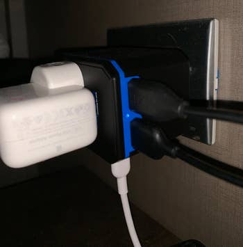 reviewer photo of the adapter being used to charge devices