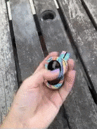 GIF of reviewer playing with the magnetic fidget ring set